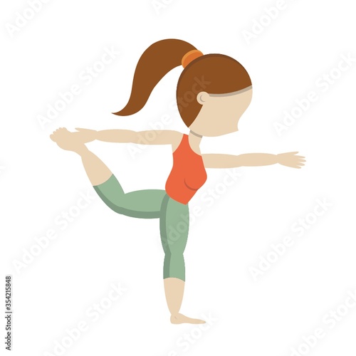 Girl practicing yoga in dancer pose