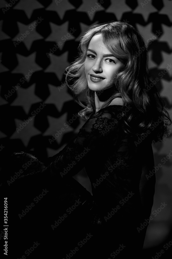 Portrait of elegant beautiful blonde woman in sexy black clothes Portrait of elegant beautiful blonde woman in sexy black clothes