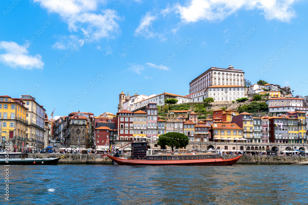 Traditional touristic boats on Douro River in the city of Porto, Portugal