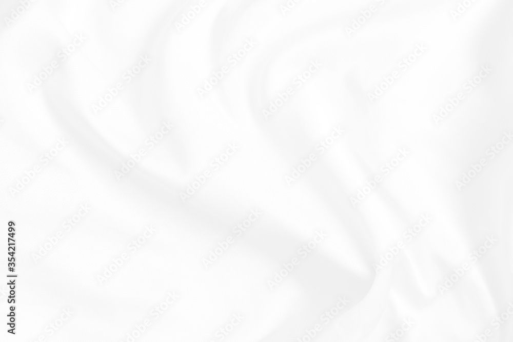 White fabric backround abstract with soft waves. Elegant and luxury silk satin texture.