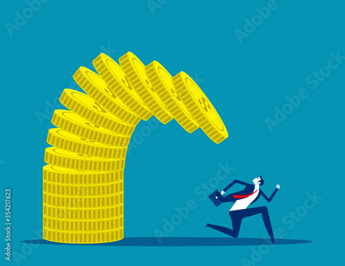 Businessman running away from failing pile or stack of coins.