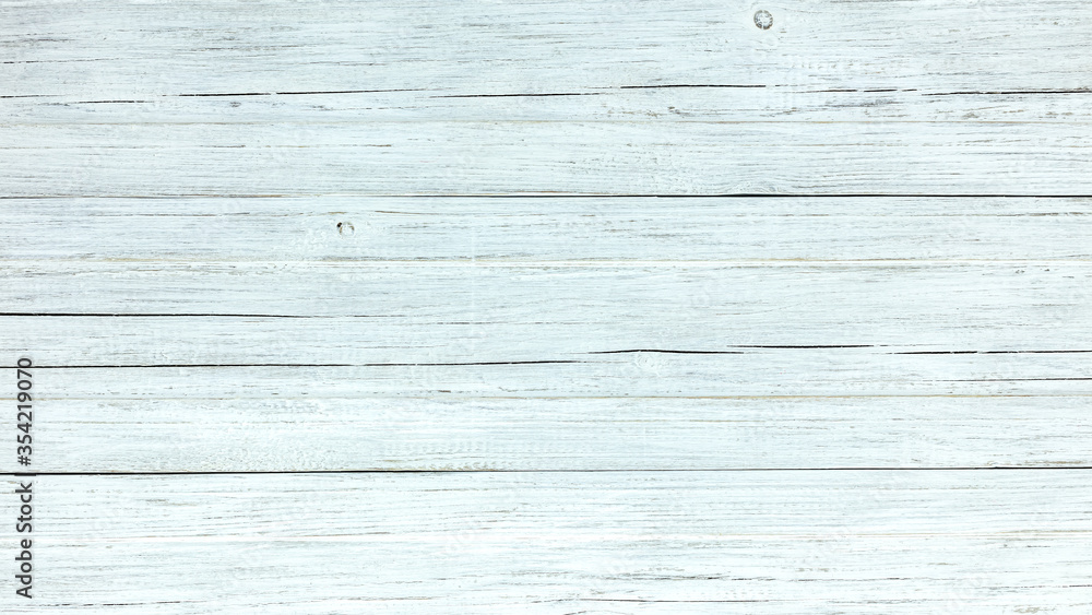 old wooden boards with cracks. background of weathered planks painted white old wooden boards with cracks. background of weathered planks painted white