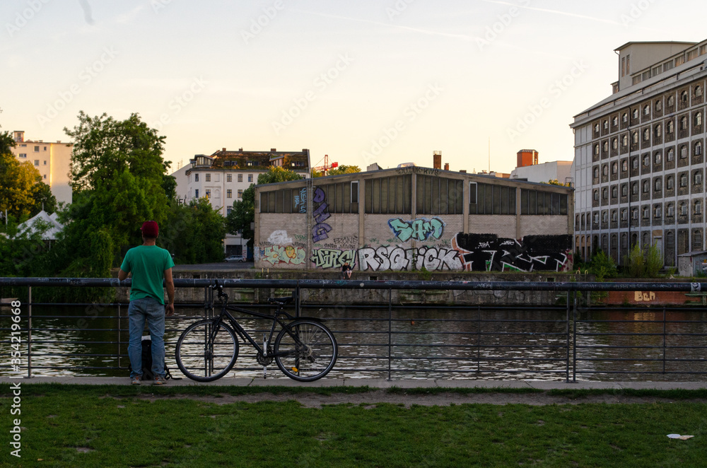 Lonely Man With A Bicycle On The River Spree