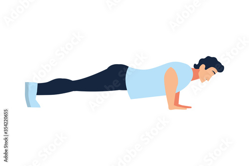man doing muscle exercises at home