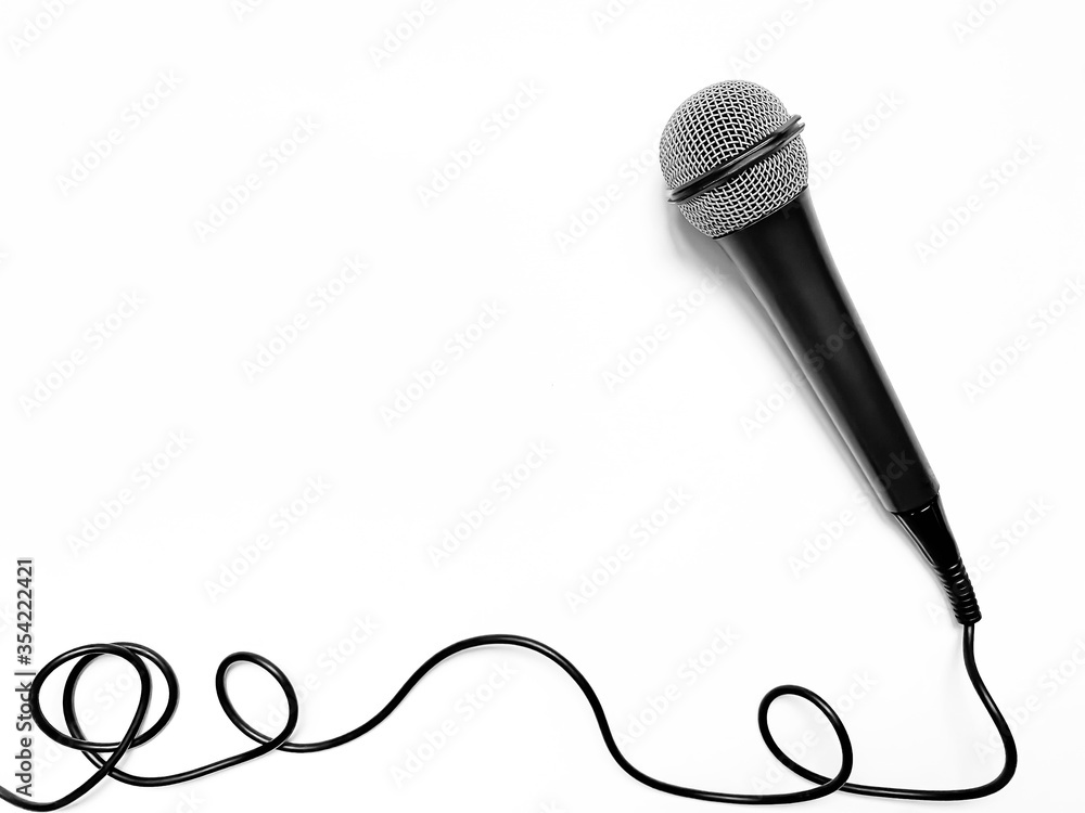 microphone for karaoke with a wire isolated on a white background. top view,  flat lay, copy space for your text Photos | Adobe Stock