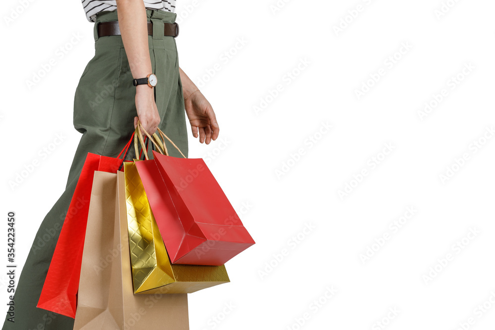 Happy pretty girl holding shopping bags and walking isolated on white background with copy space, E-commerce digital marketing lifestyle concept