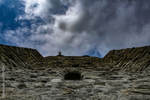 stone lookout tower and clouds