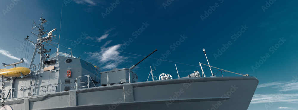 Armed military, navy, or coast guard rescue ship with guns. A warship ...