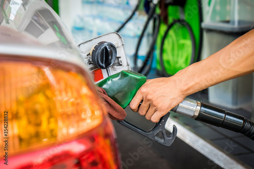 Fotografie Car refueling fuel on petrol station