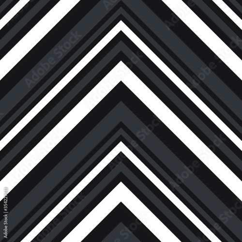 Black and White Chevron Diagonal Stripes seamless pattern background - Black and white Chevron diagonal striped seamless pattern background suitable for fashion textiles, graphics