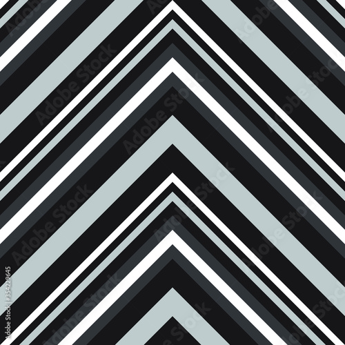 Black and White Chevron Diagonal Stripes seamless pattern background - Black and white Chevron diagonal striped seamless pattern background suitable for fashion textiles, graphics