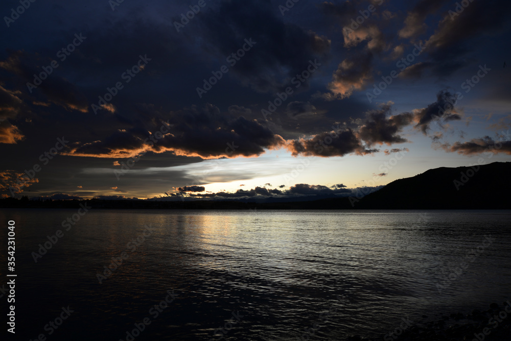 Sunset at lake tekapo shore Sunset at lake tekapo shore