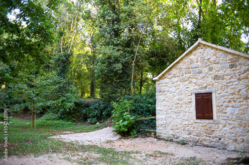 Old stone house in a Croatian forest.