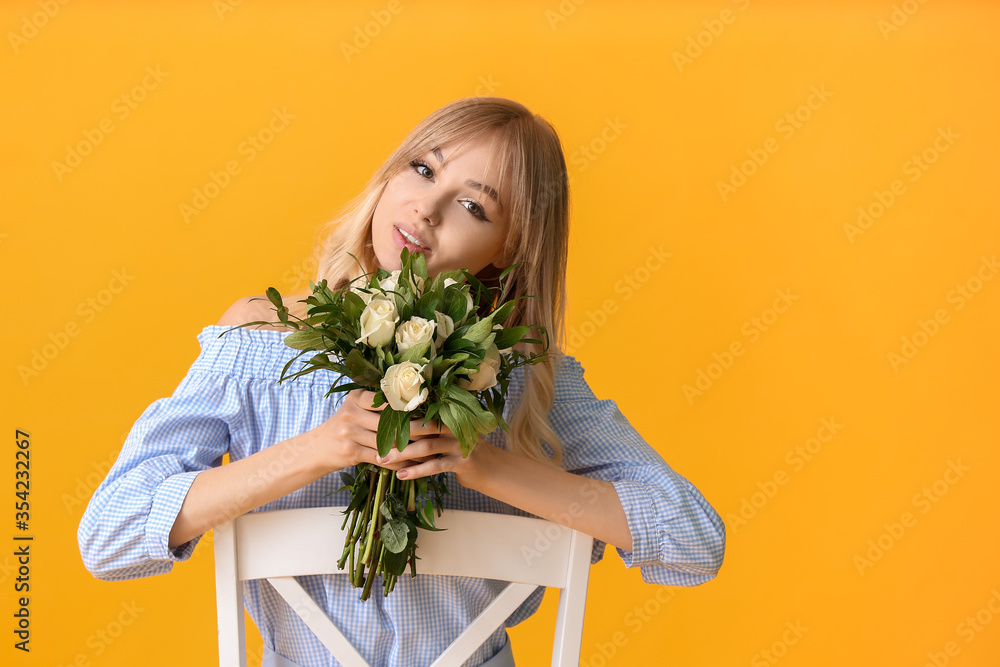 Beautiful young woman with bouquet of roses on color background Beautiful young woman with bouquet of roses on color background
