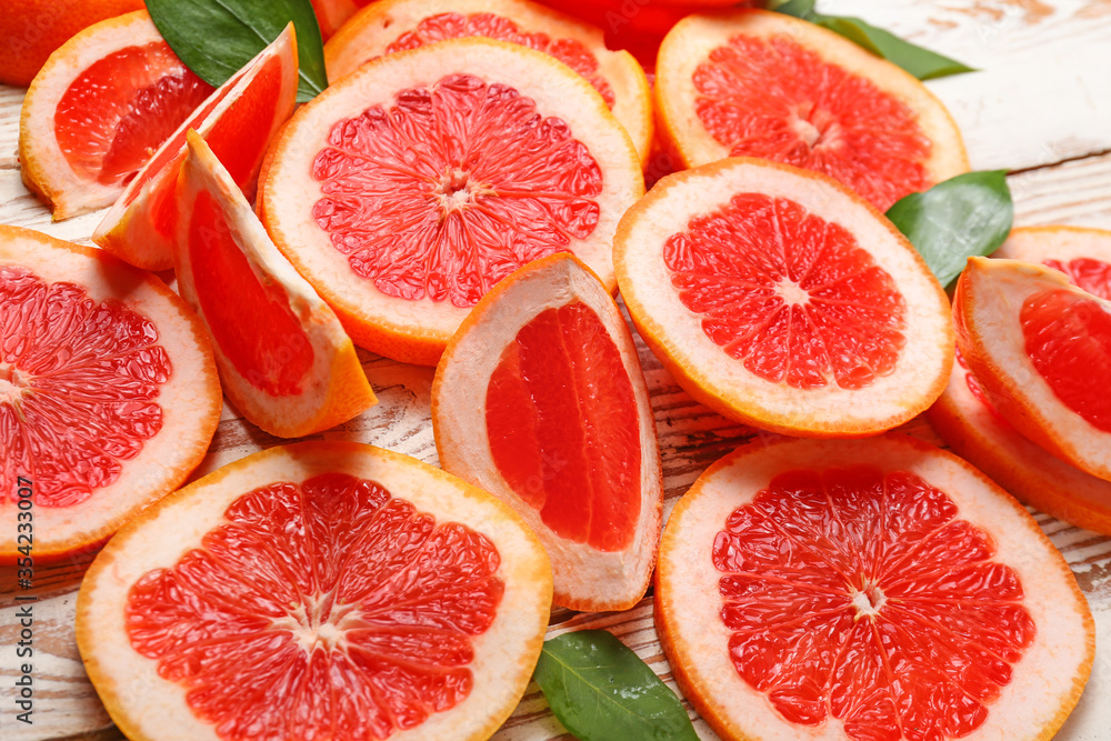 Fresh cut grapefruit on table Fresh cut grapefruit on table