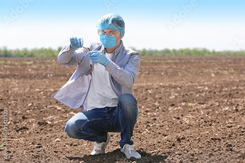 Scientist studying samples ...