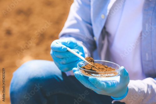 Scientist studying samples ...