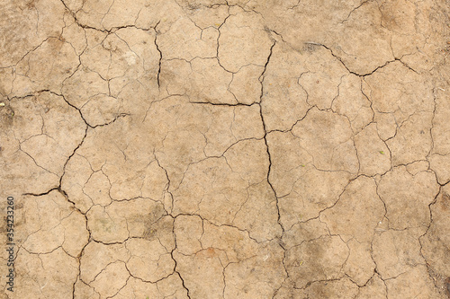 Fotótapéta Texture of dry soil, closeup view