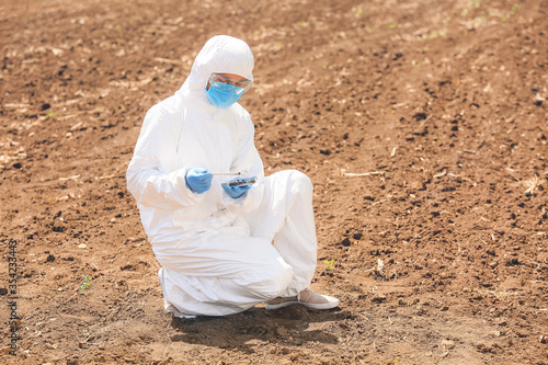Scientist studying samples ...