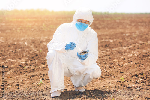 Scientist studying samples ...