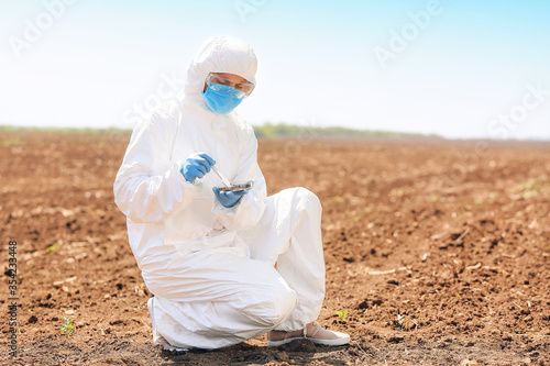 Scientist studying samples ...