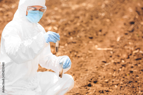 Scientist studying samples ...