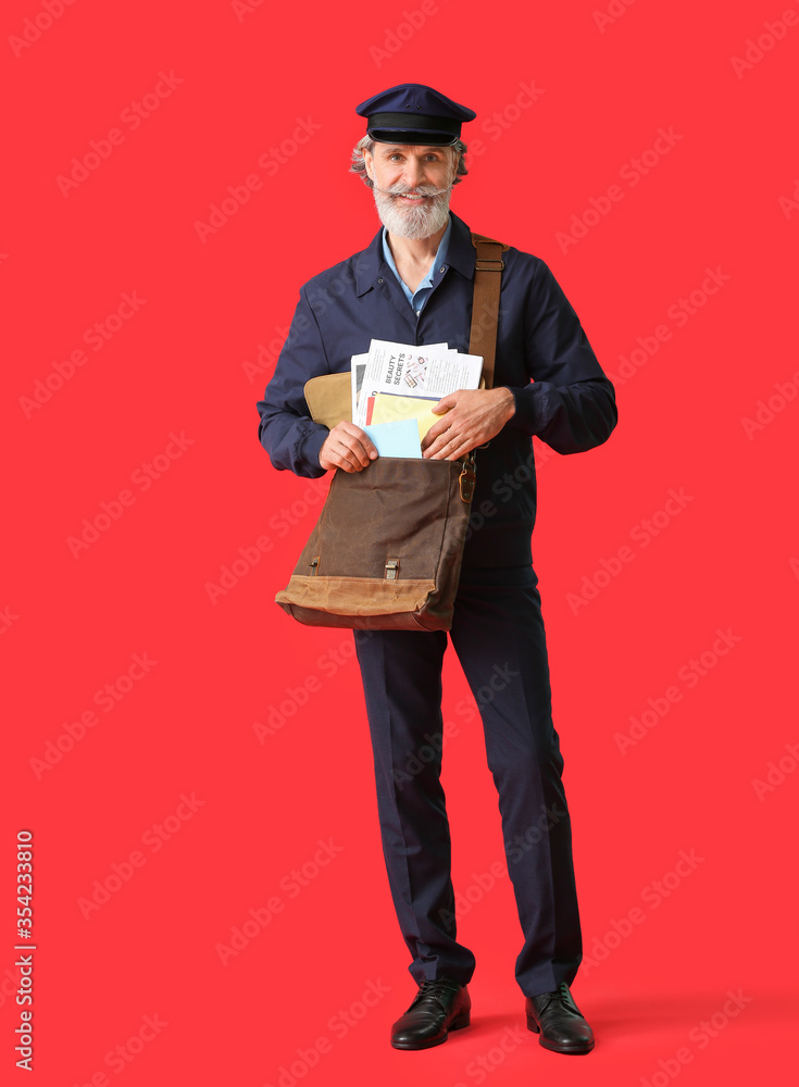Handsome old postman on color background Handsome old postman on color background