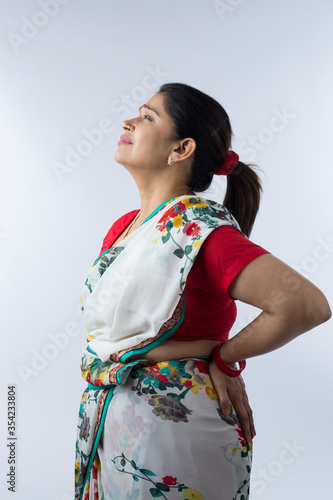 Photography Woman having back pain, suffering health problems.