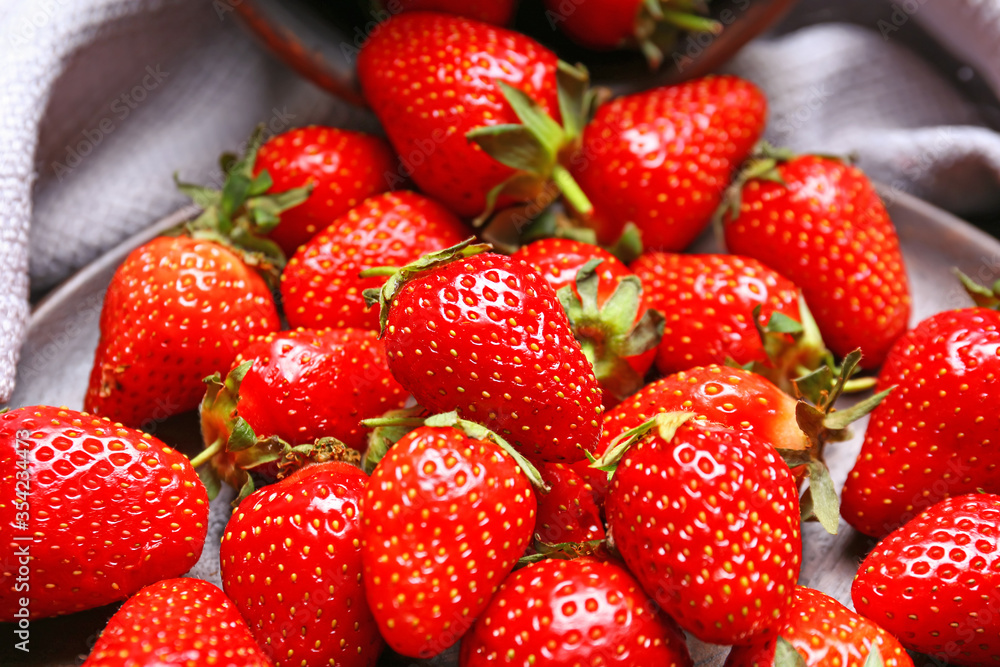 Sweet ripe strawberry on table, closeup Sweet ripe strawberry on table, closeup