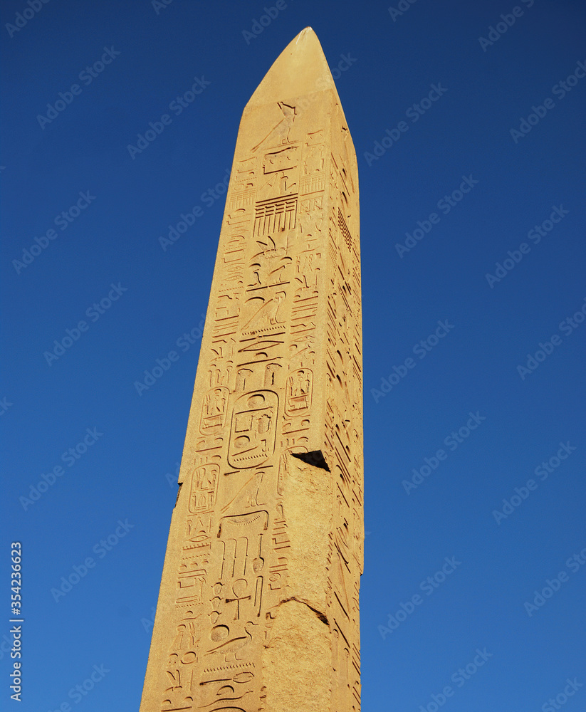 Ancient column, obelisk and pillar in Temple of Karnak. Egypt