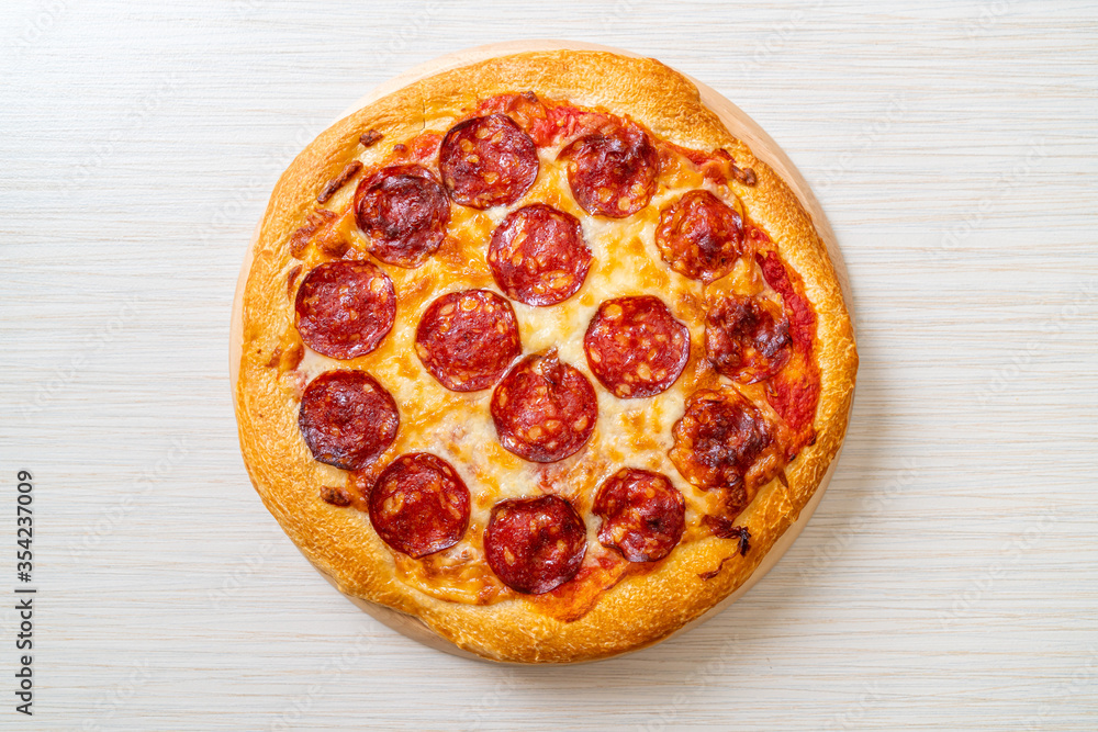 pepperoni pizza on wood tray pepperoni pizza on wood tray