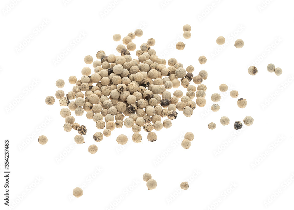 heap of white pepper peas close-up on a white background, top view heap of white pepper peas close-up on a white background, top view