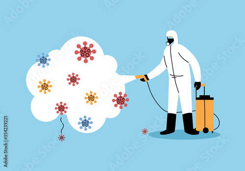 man wears protective suit, disinfection by coronavirus or covid 19