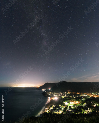 Night view from Bald Hill lookout with starry sky.