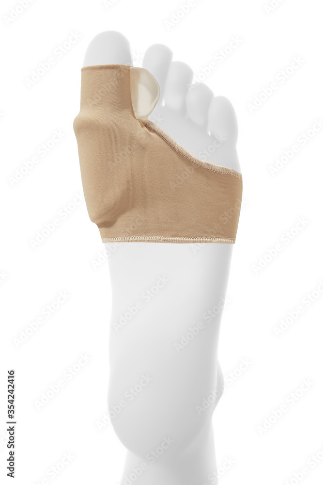 Φωτογραφία Detailed shot of a beige cloth toe protectors with gel cushions for bunion pain relief