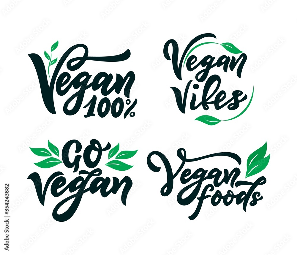 Vegan set of labels. Go, vibes, foods. With green leaves. Hand calligraphy lettering. Vector illustration Vegan set of labels. Go, vibes, foods. With green leaves. Hand calligraphy lettering. Vector illustration