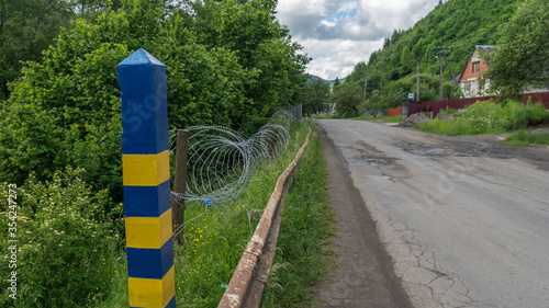 Border post Ukraine near the road. Rural and safety concept.