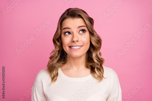 Close-up portrait of her she nice-looking attractive lovely charming cheerful cheery wavy-haired girl thinking creating new strategy isolated over pink pastel color background