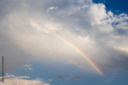 rainbow over blue sky © pun483