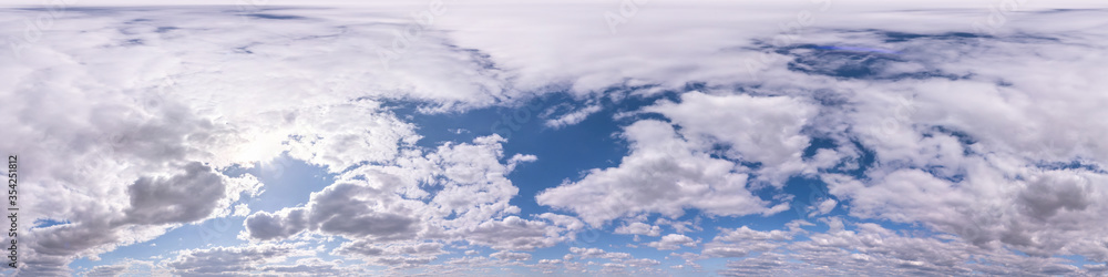 Seamless hdri panorama 360 degrees angle view blue sky with beautiful fluffy cumulus clouds with zenith for use in 3d graphics or game development as sky dome or edit drone shot Seamless hdri panorama 360 degrees angle view blue sky with beautiful fluffy cumulus clouds with zenith for use in 3d graphics or game development as sky dome or edit drone shot