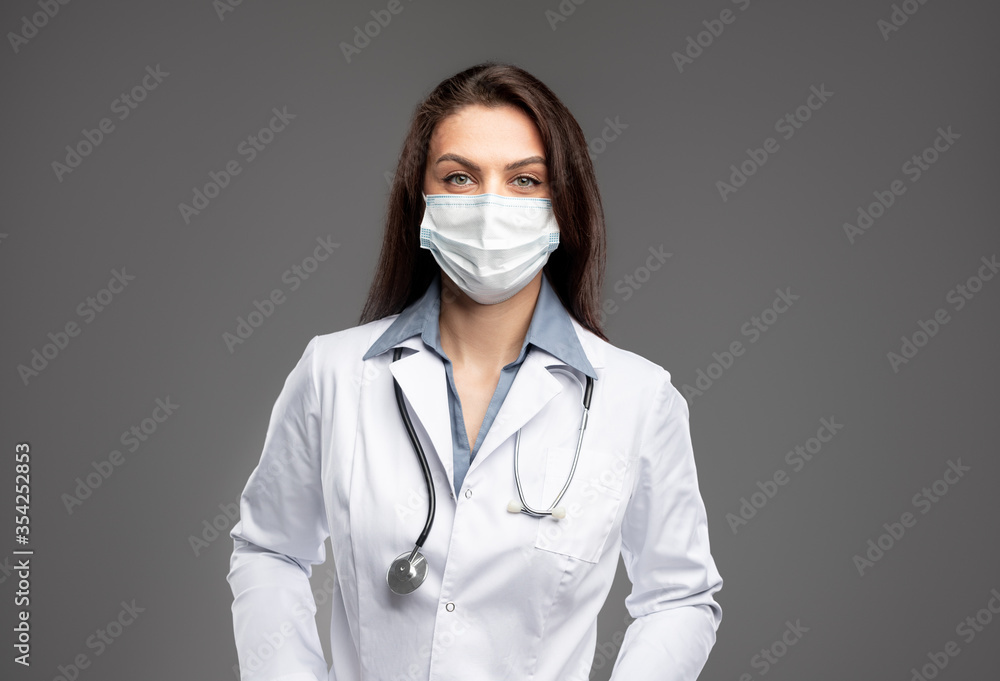 Confident female doctor in medical mask Confident female doctor in medical mask