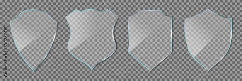 Shield glass. Glass icon of guard isolated on transparent background. Defense symbols. Badge award for protection and safety. 3d frame with shine glossy. Clean plexiglass and acrylic emblem. Vector