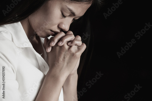  Woman Pray for god blessing to wishing have a better life. begging for forgiveness and believe in goodness. Christian life crisis prayer to god. Religious concepts.