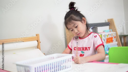 4K : Asian students doing homework at home