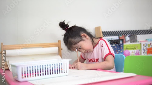 4K : Asian students doing homework at home