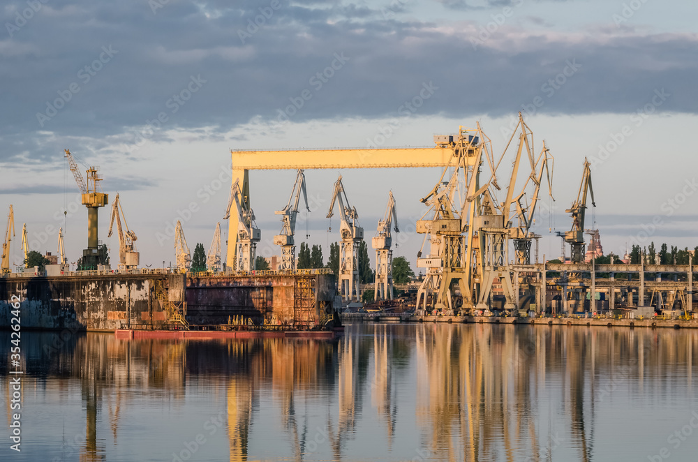 Fototapeta premium SHIPAYARD - Floating dock, gantry and cranes on repair quays 