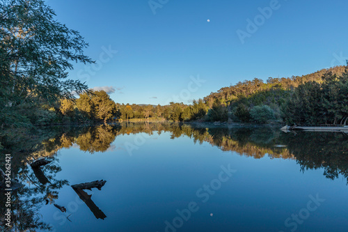 Murrumbidgee River looking placid with the reflection of the moon photo