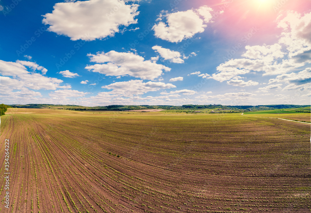 Arable field with beautiful sky. Springtime Arable field with beautiful sky. Springtime