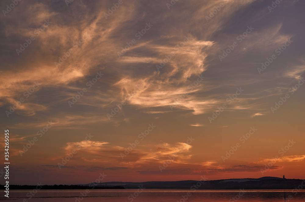 sky at sunset in warm tones and mottled blocks sky at sunset in warm tones and mottled blocks