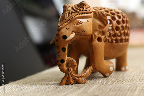 Traditional Indian souvenir. Indian elephant.  Made of wood souvenir. Selective focus.